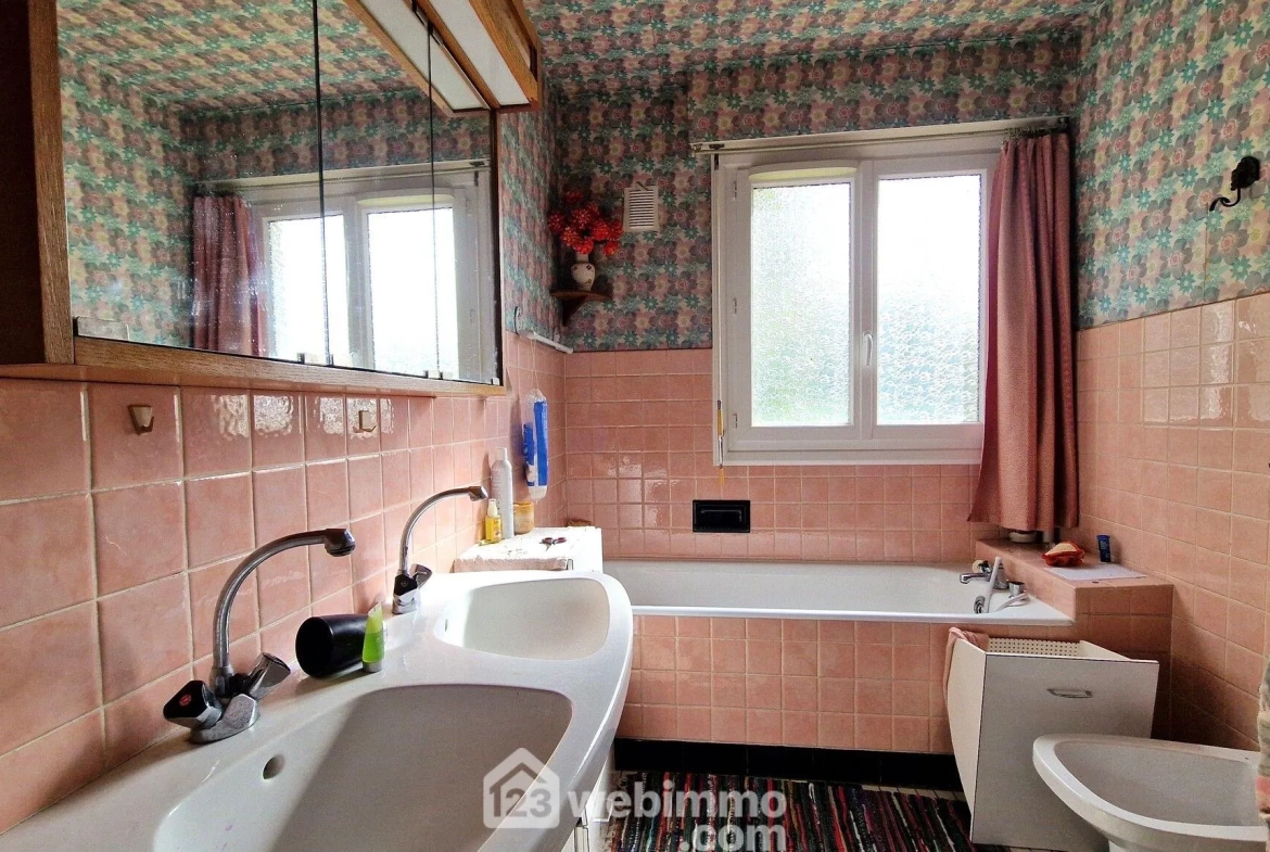 Maison individuelle de 141 m² avec jardin et garage à Laon 