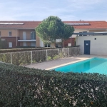 Appartement T4 avec terrasse, piscine et parking à Roanne - Résidence sécurisée