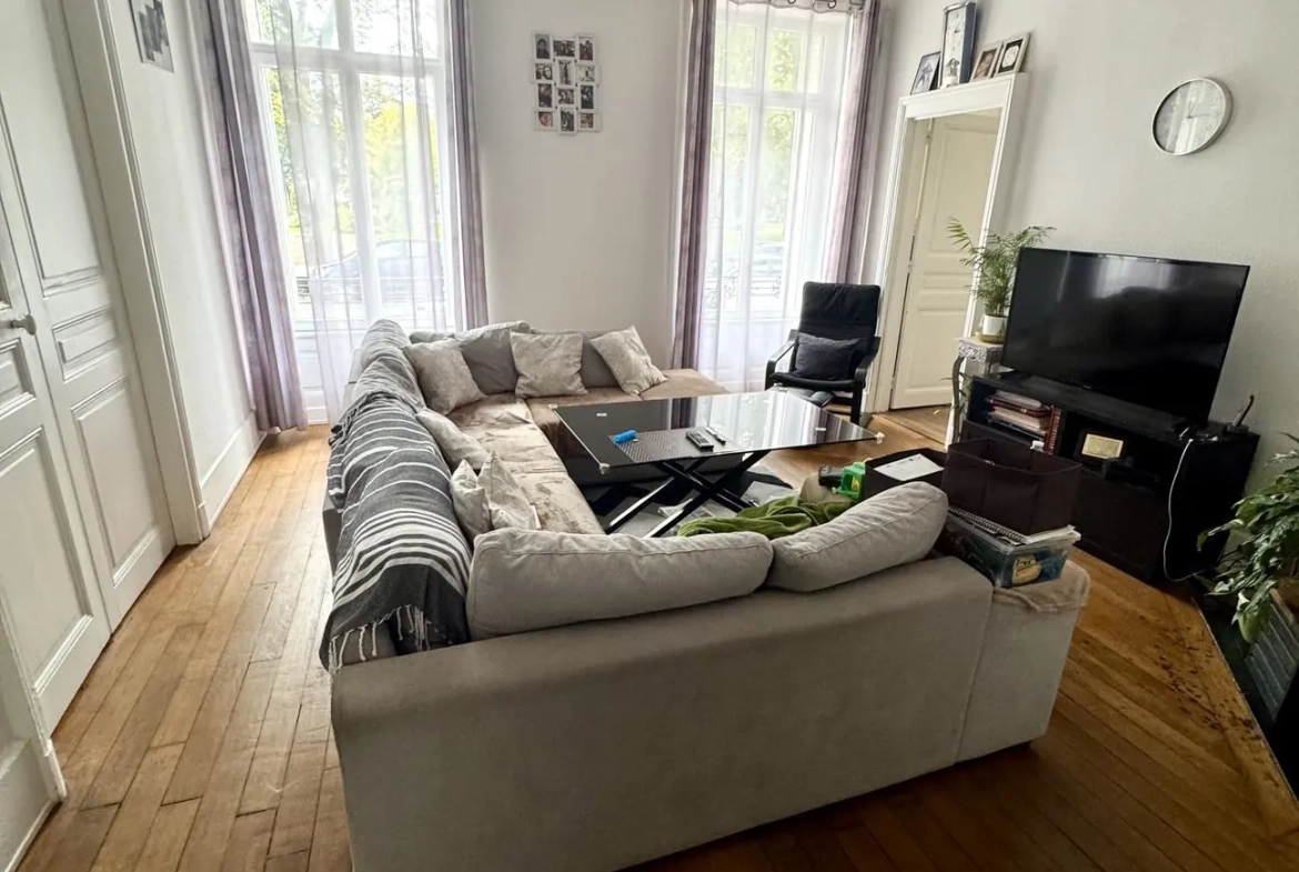Appartement 4 pièces à Épinal avec charme ancien et cave, proche commodités 