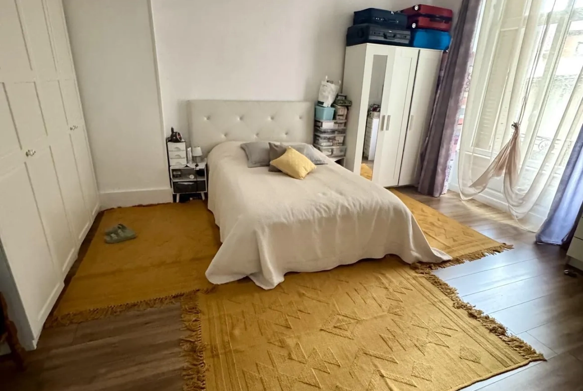 Appartement 4 pièces à Épinal avec charme ancien et cave, proche commodités 