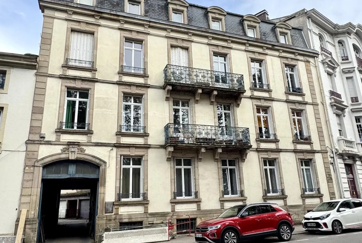 Appartement 4 pièces à Épinal avec charme ancien et cave, proche commodités 