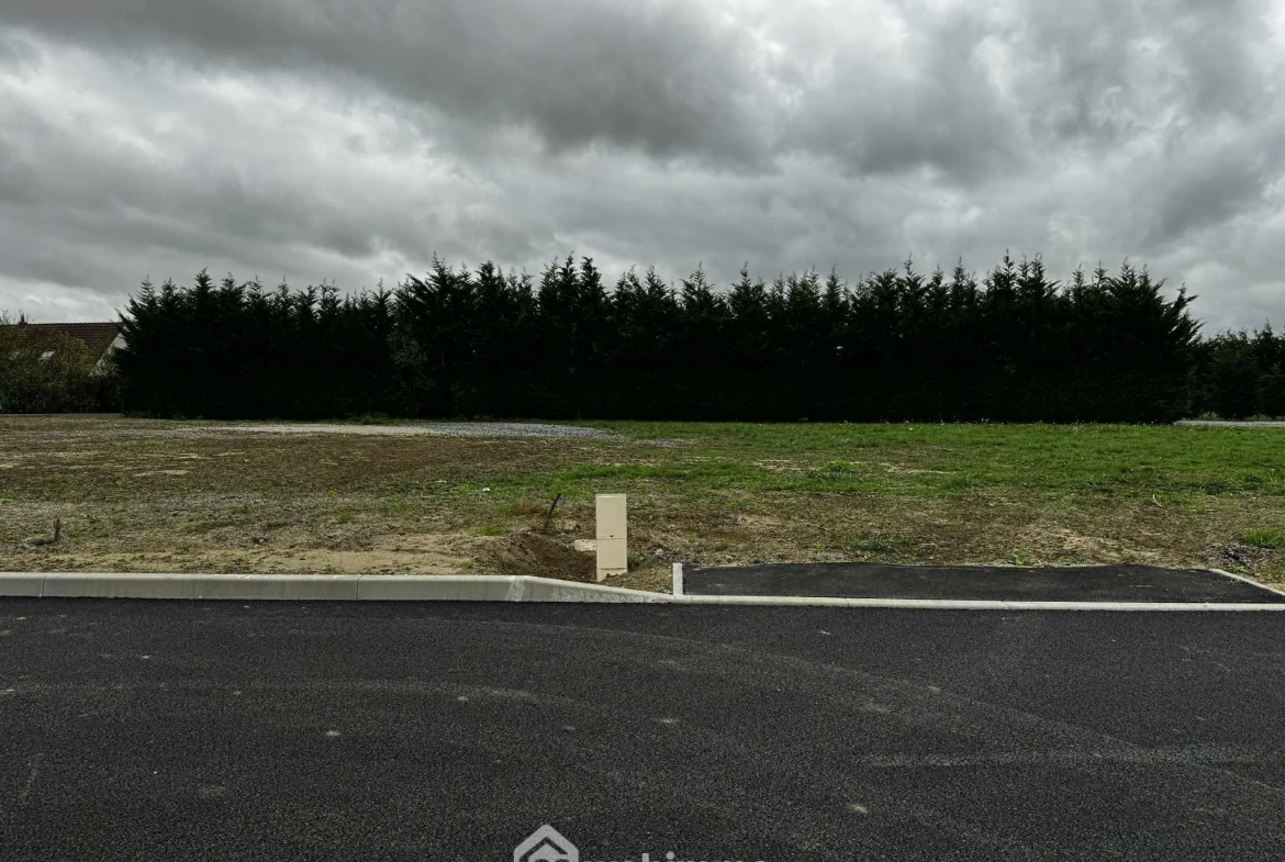Terrain constructible de 606 m² à Versigny, viabilisé et prêt à bâtir 