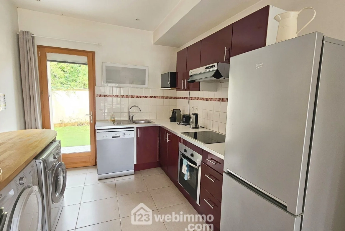 Appartement 3 pièces avec balcon et garages à Saint-Aubin-lès-Elbeuf 