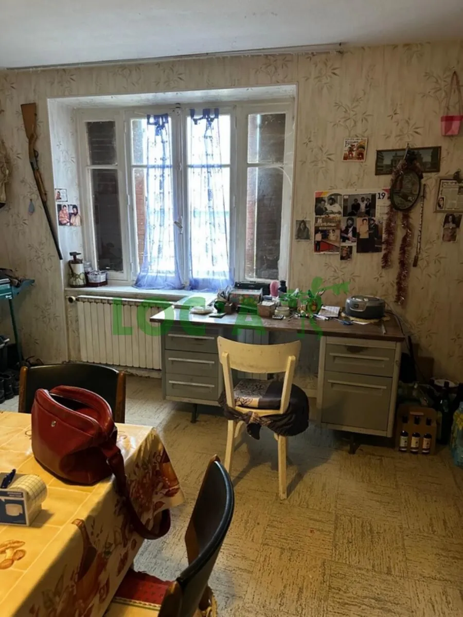 Maison mitoyenne de 75 m² à Genlis à rénover avec jardin 