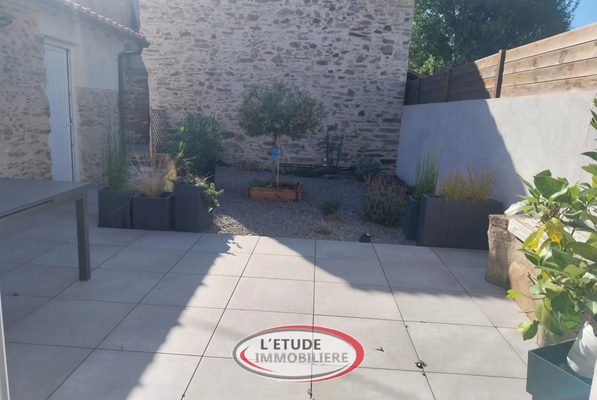 Belle maison rénovée à Sainte-Pazanne avec terrasse et stationnement privé 