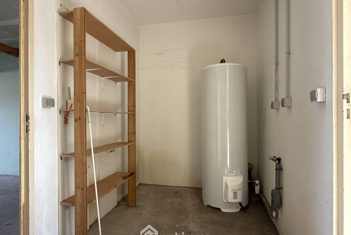 Maison de plain-pied à vendre à Quinçay - 115 m², 4 chambres, garage 