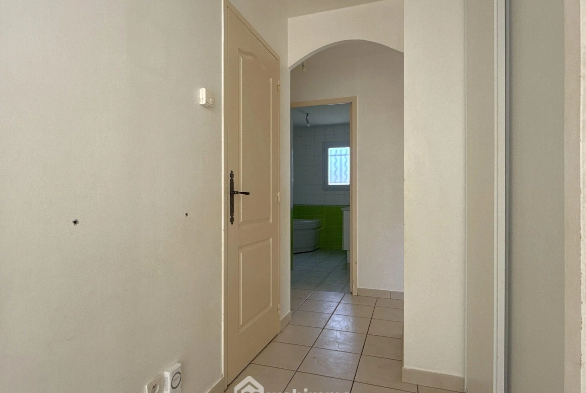 Maison de plain-pied à vendre à Quinçay - 115 m², 4 chambres, garage 