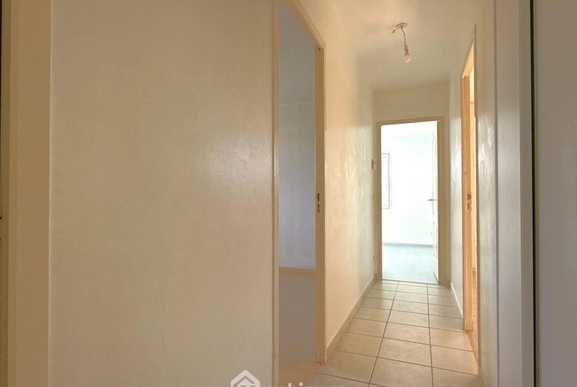 Maison de plain-pied à vendre à Quinçay - 115 m², 4 chambres, garage 