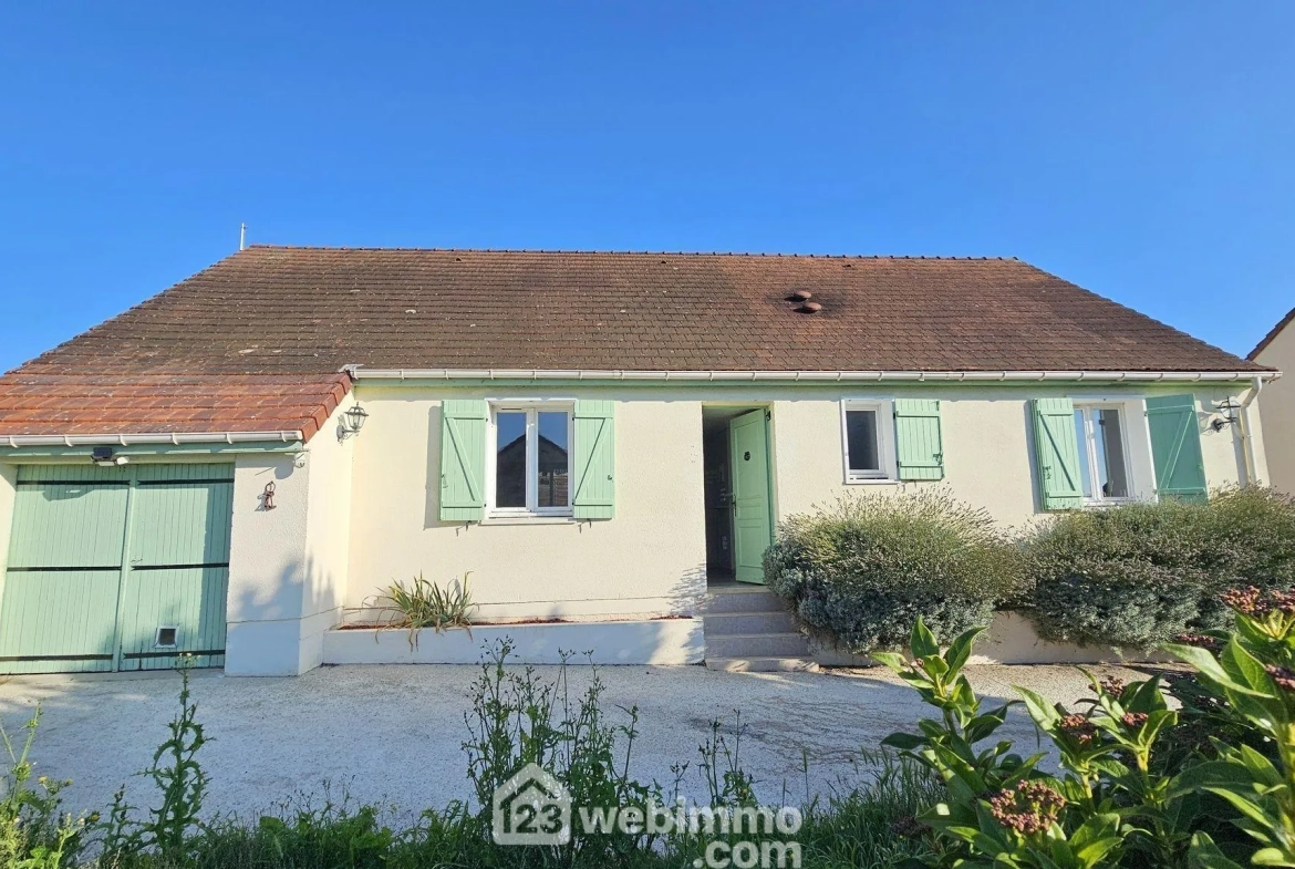 Maison de plain-pied de 100 m² avec jardin à La Grande Paroisse 