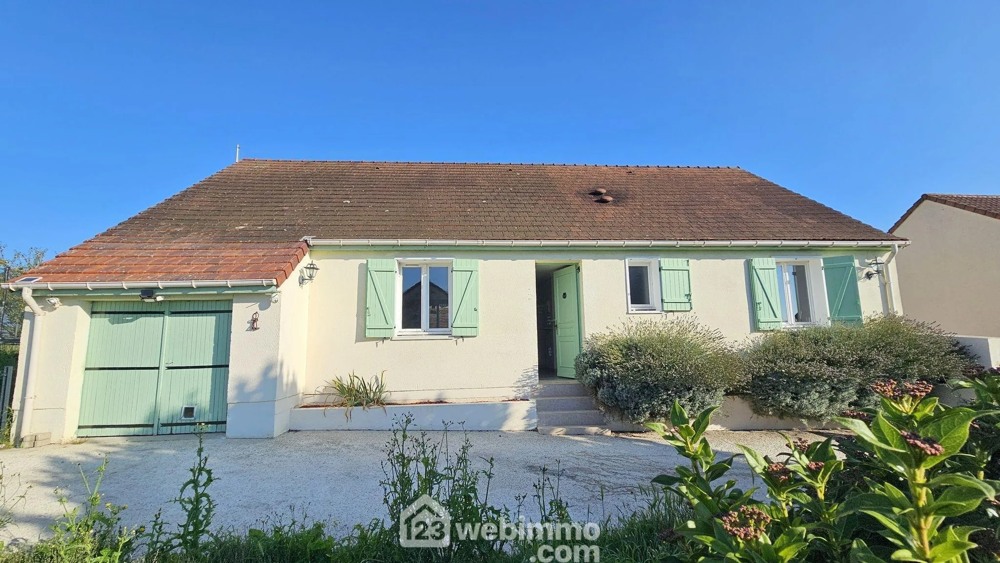 Maison de plain-pied de 100 m² avec jardin à La Grande Paroisse 