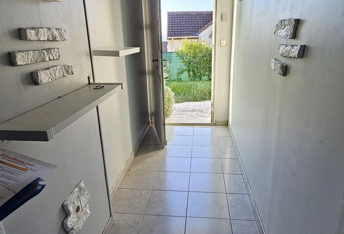 Maison de plain-pied de 100 m² avec jardin à La Grande Paroisse 