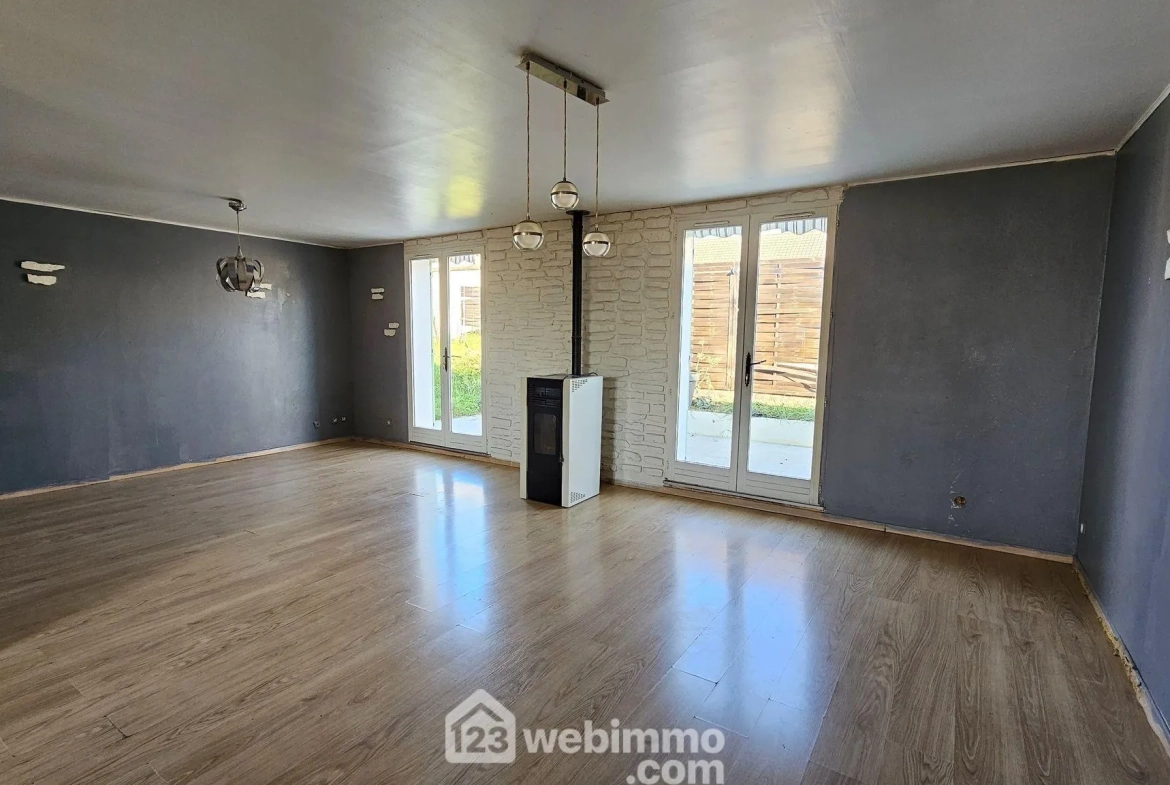 Maison de plain-pied de 100 m² avec jardin à La Grande Paroisse 
