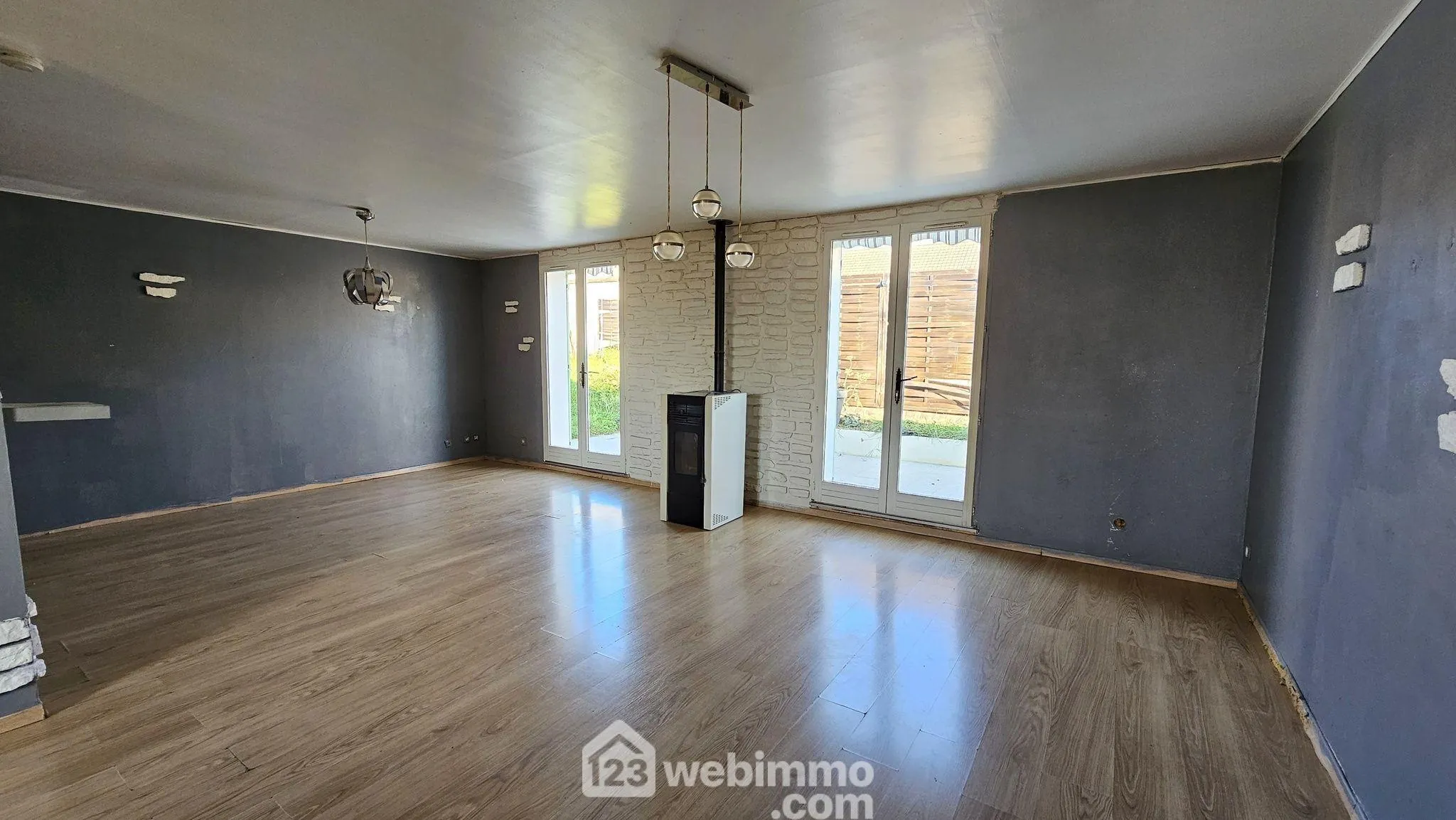 Maison de plain-pied de 100 m² avec jardin à La Grande Paroisse 