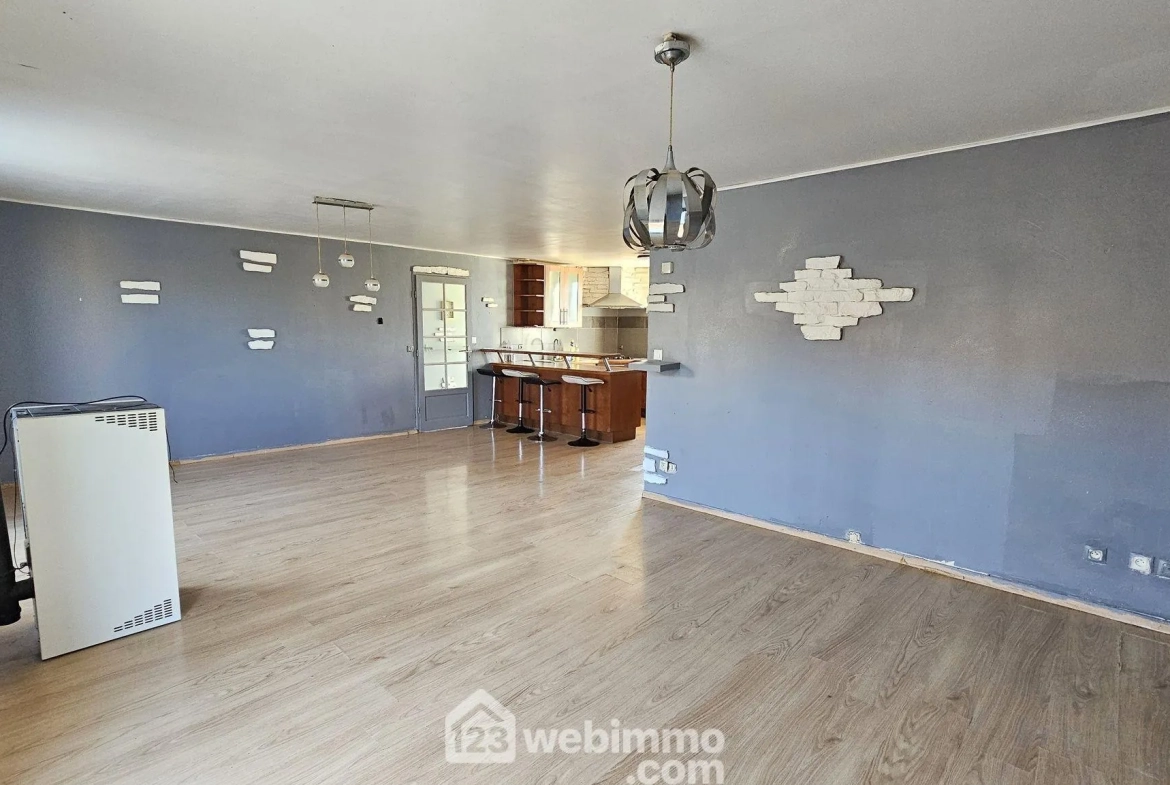 Maison de plain-pied de 100 m² avec jardin à La Grande Paroisse 
