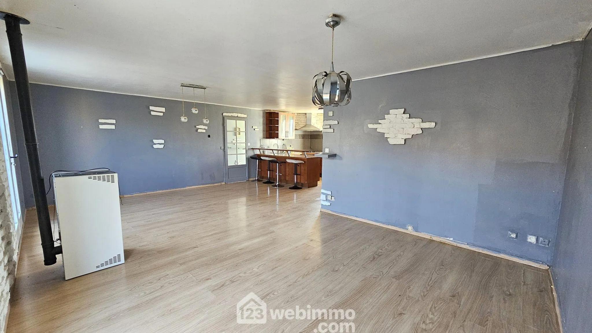 Maison de plain-pied de 100 m² avec jardin à La Grande Paroisse 