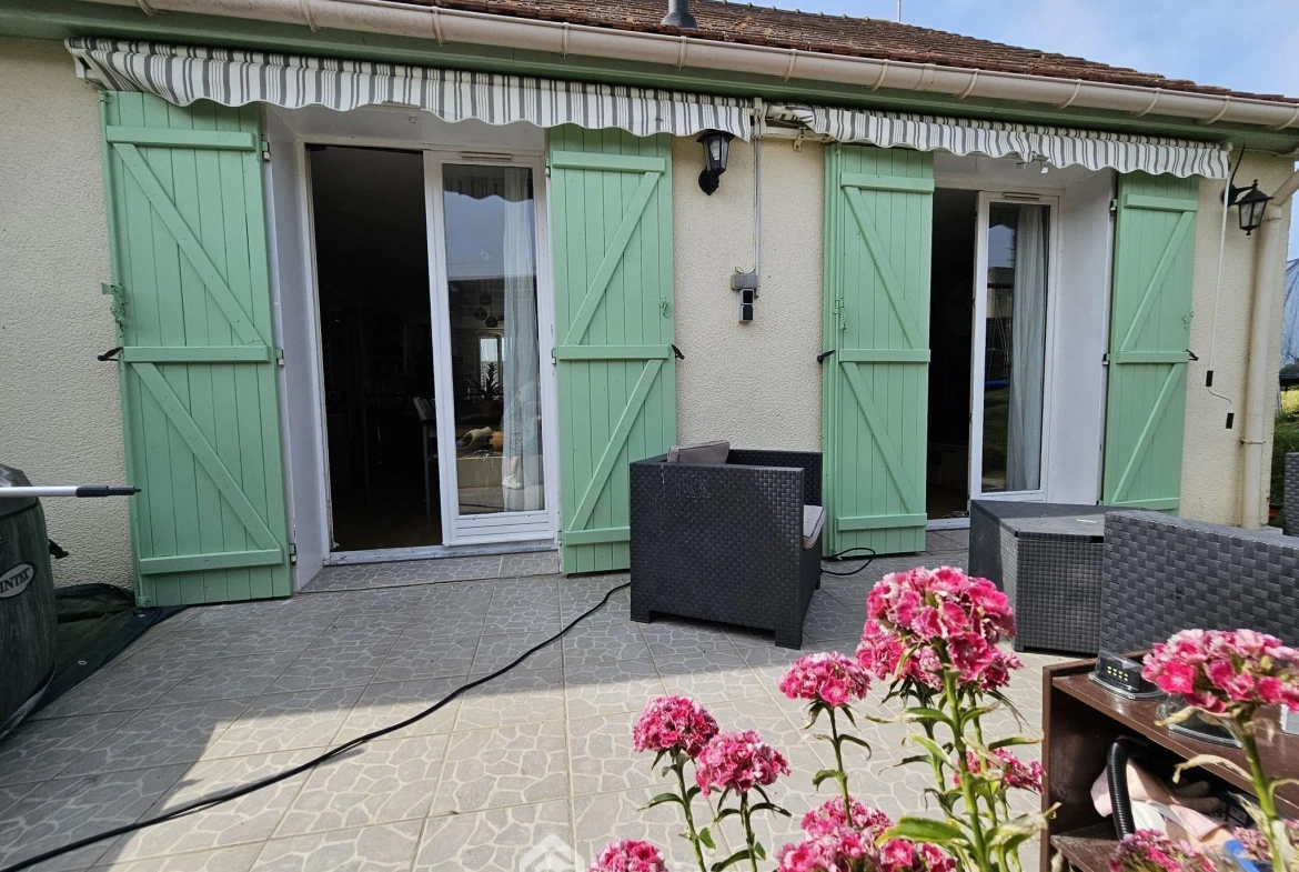 Maison de plain-pied de 100 m² avec jardin à La Grande Paroisse 