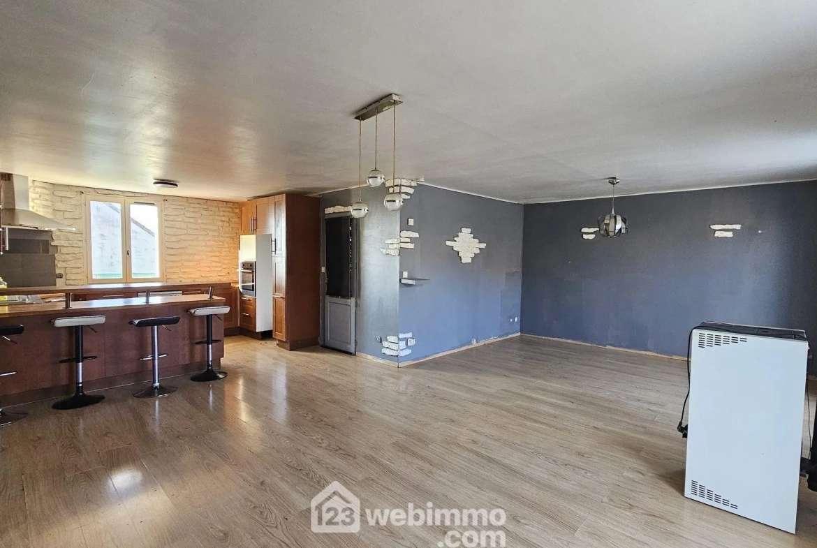 Maison de plain-pied de 100 m² avec jardin à La Grande Paroisse 