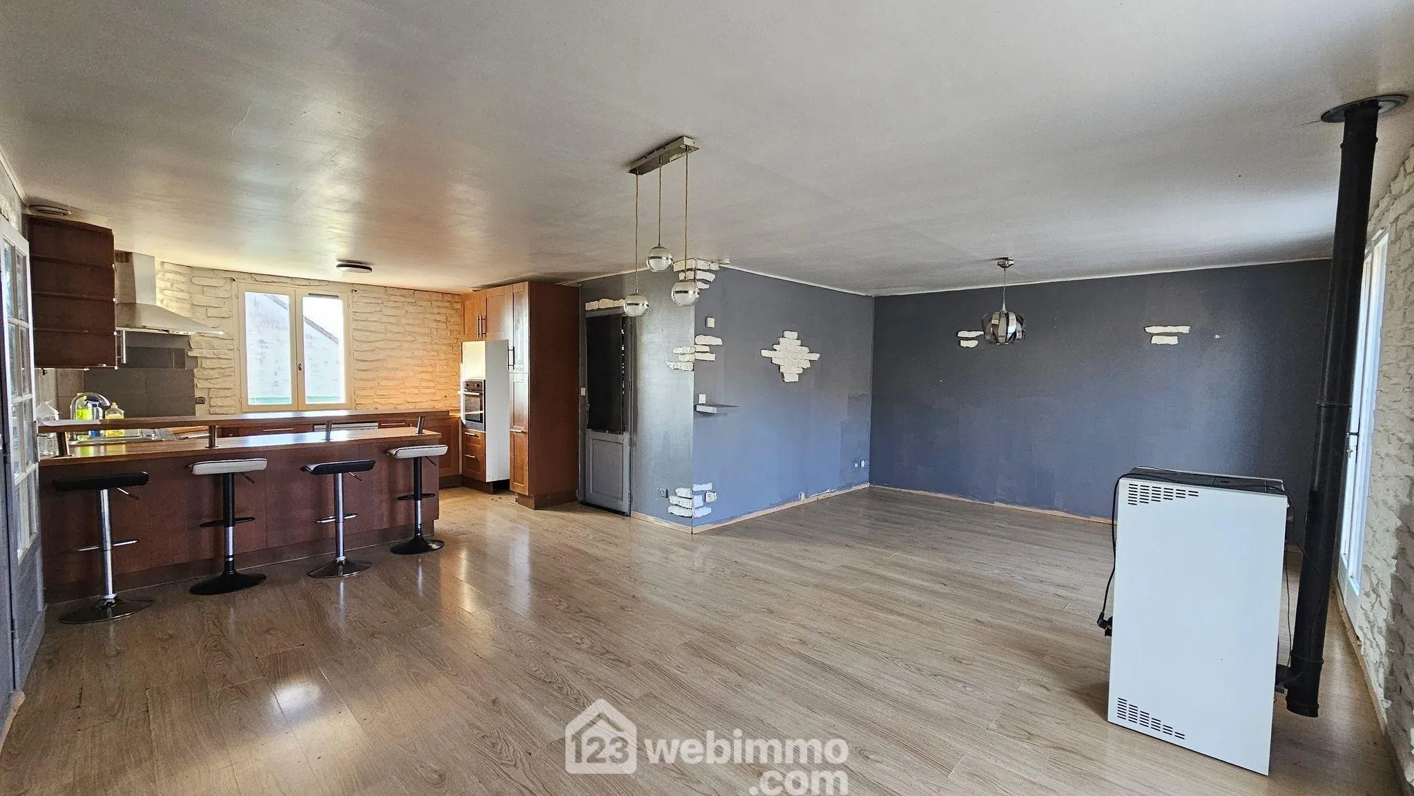 Maison de plain-pied de 100 m² avec jardin à La Grande Paroisse 