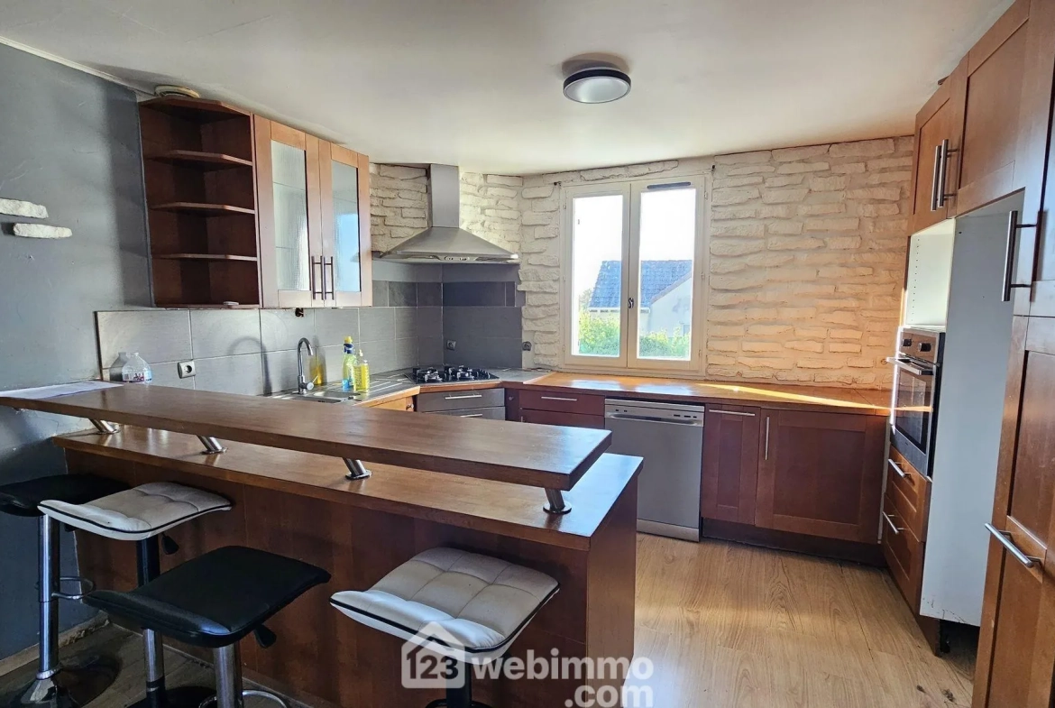 Maison de plain-pied de 100 m² avec jardin à La Grande Paroisse 