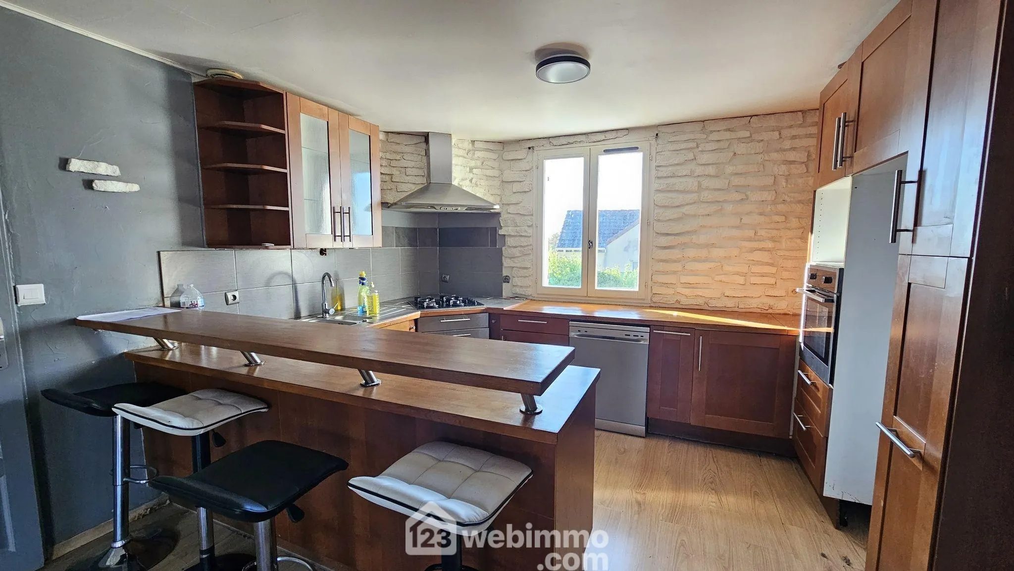 Maison de plain-pied de 100 m² avec jardin à La Grande Paroisse 