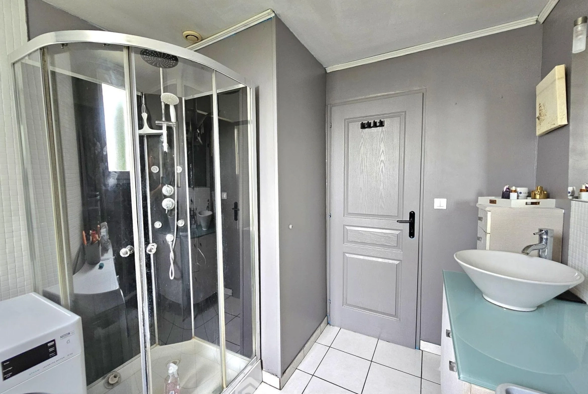 Maison de plain-pied de 100 m² avec jardin à La Grande Paroisse 