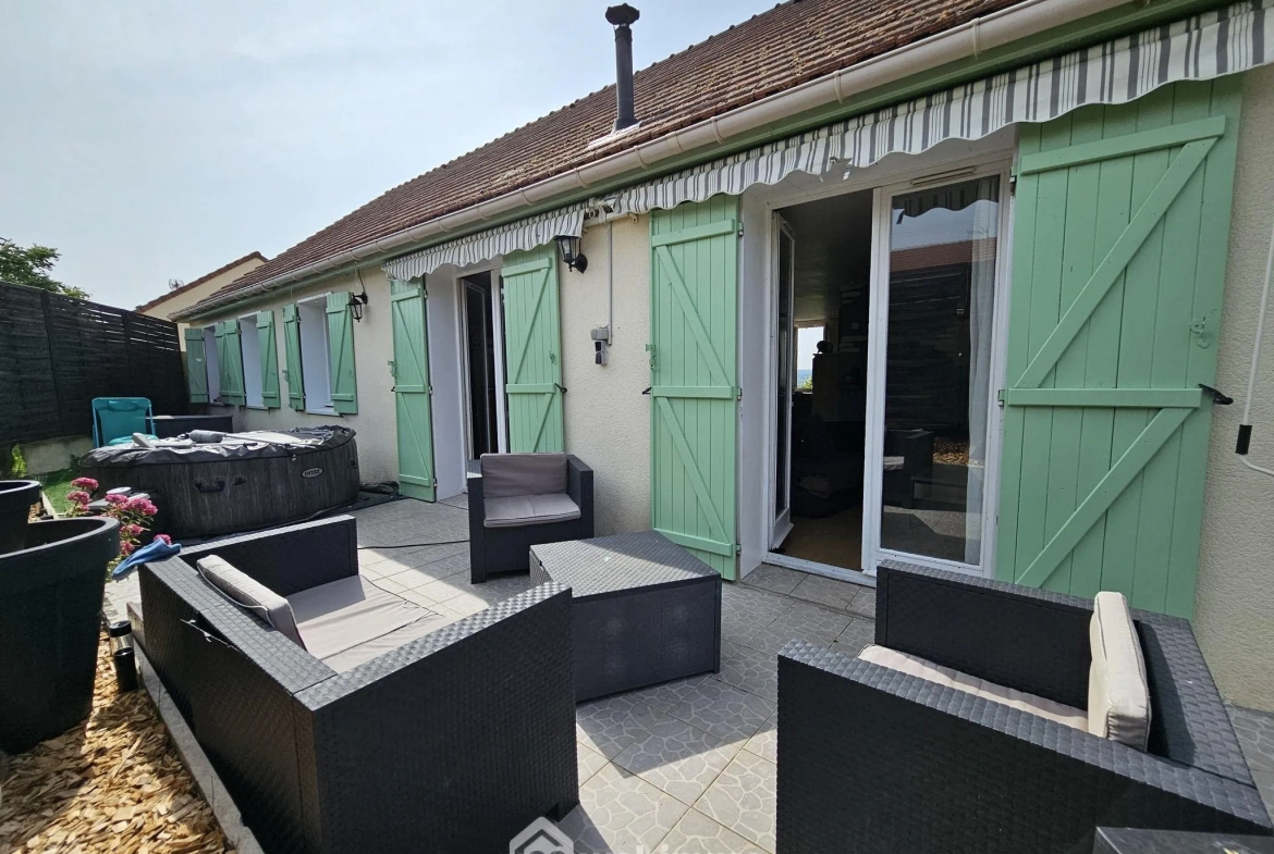 Maison de plain-pied de 100 m² avec jardin à La Grande Paroisse 