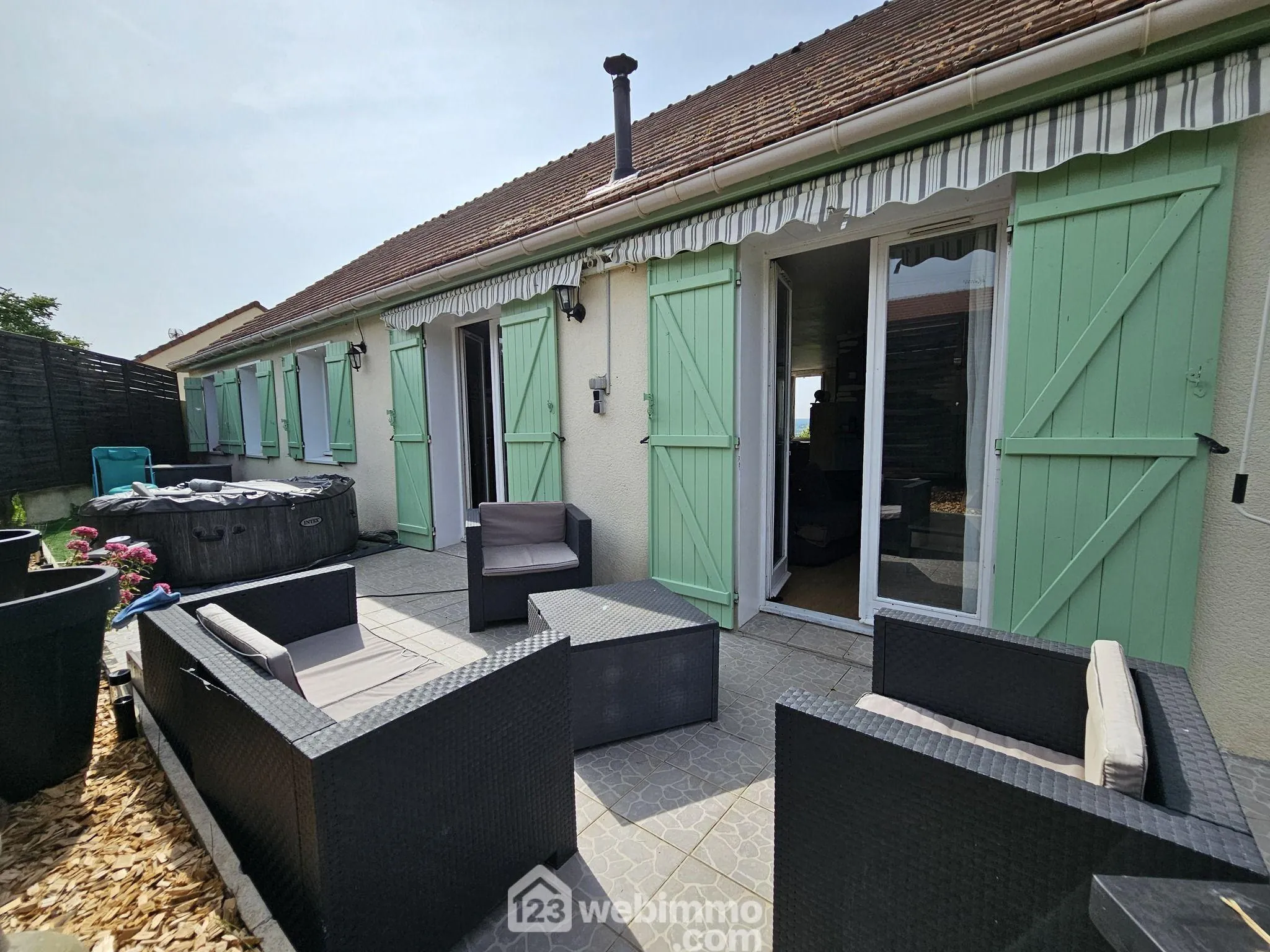 Maison de plain-pied de 100 m² avec jardin à La Grande Paroisse 