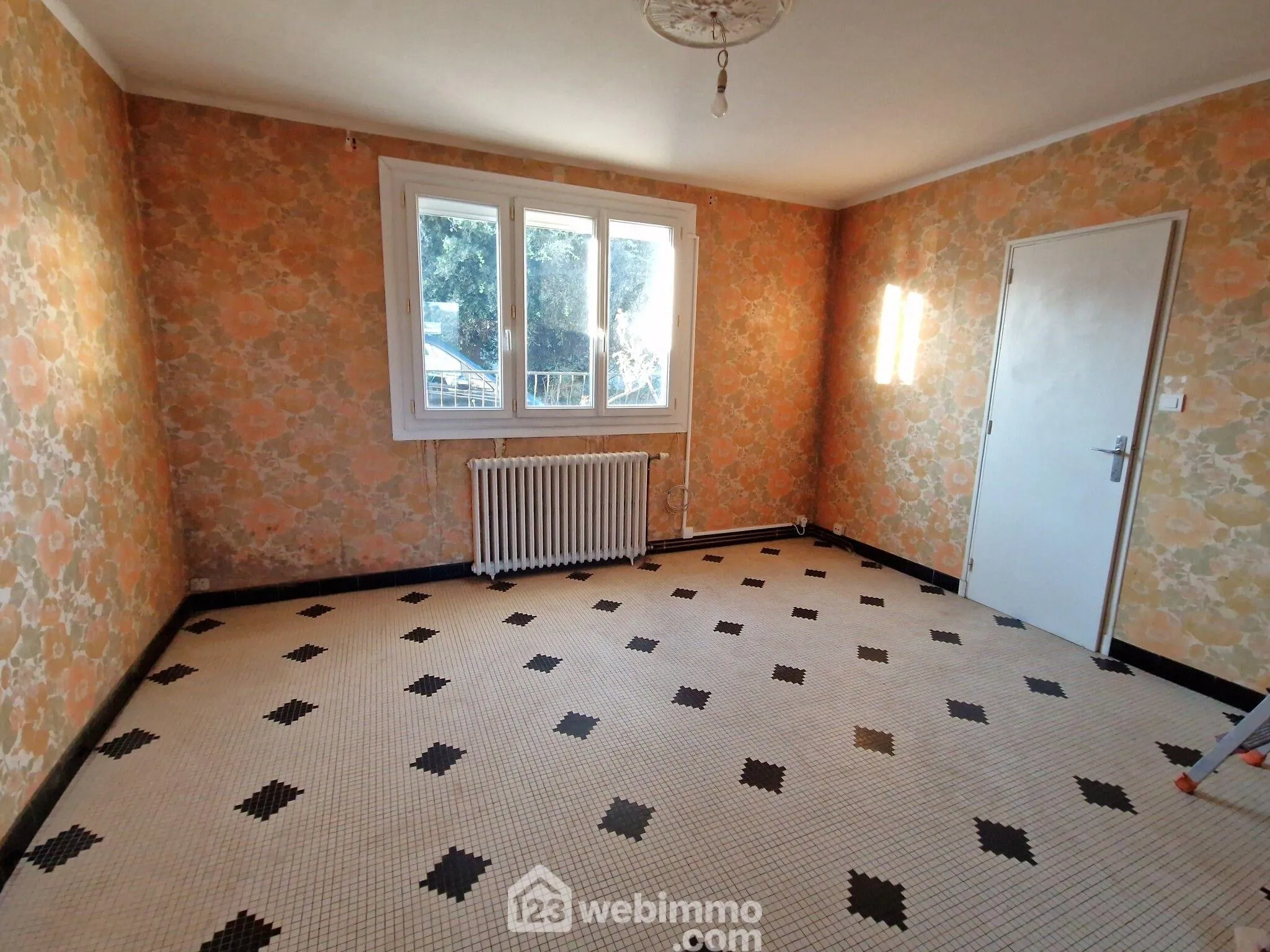 Maison de ville à vendre à La Roche-sur-Yon avec jardin et garage 