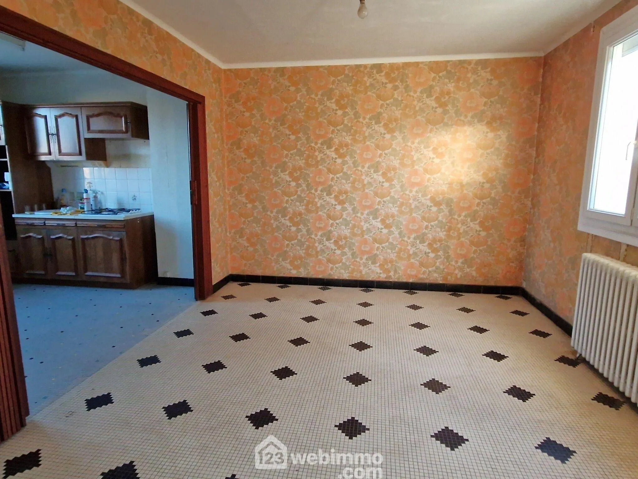 Maison de ville à vendre à La Roche-sur-Yon avec jardin et garage 