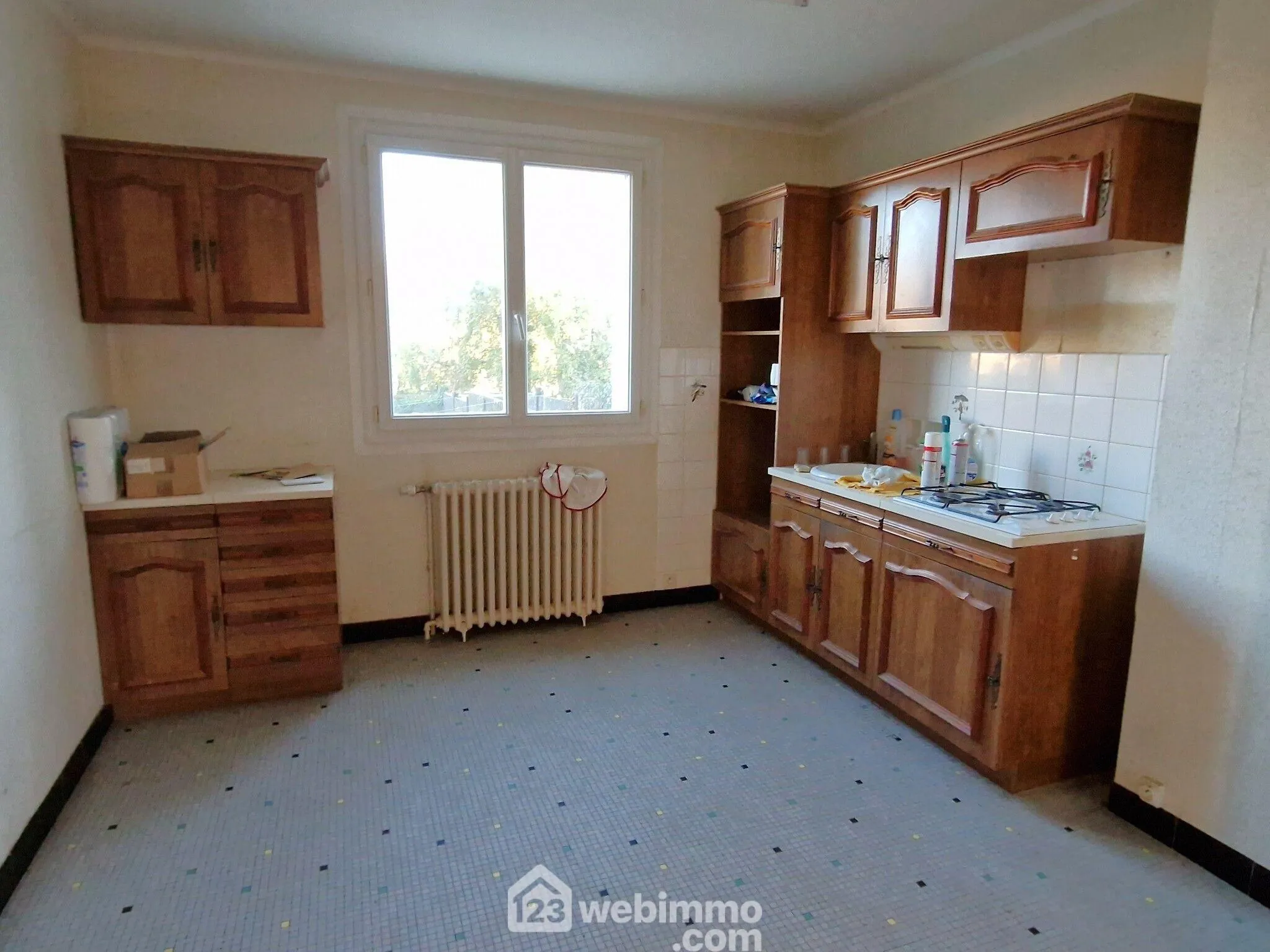 Maison de ville à vendre à La Roche-sur-Yon avec jardin et garage 