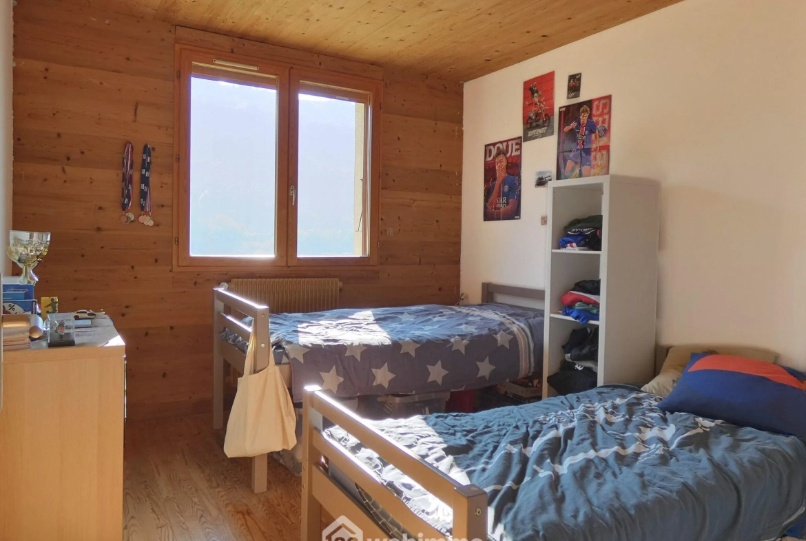 Appartement T4 en rez-de-jardin avec jardin à Marthod 