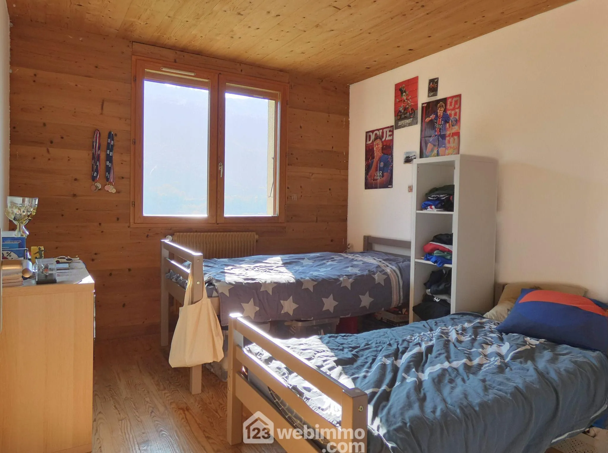Appartement T4 en rez-de-jardin avec jardin à Marthod 
