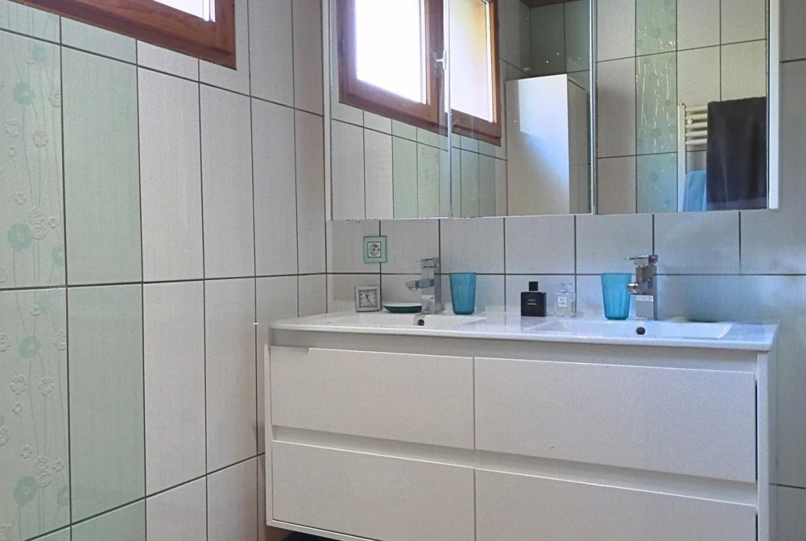 Appartement T4 en rez-de-jardin avec jardin à Marthod 