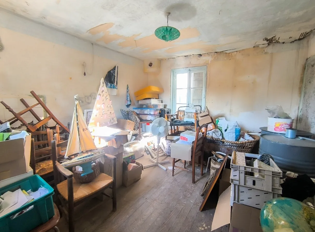 Ensemble immobilier à Chezy-sur-Marne avec maison de charme et potentiel de rénovation 