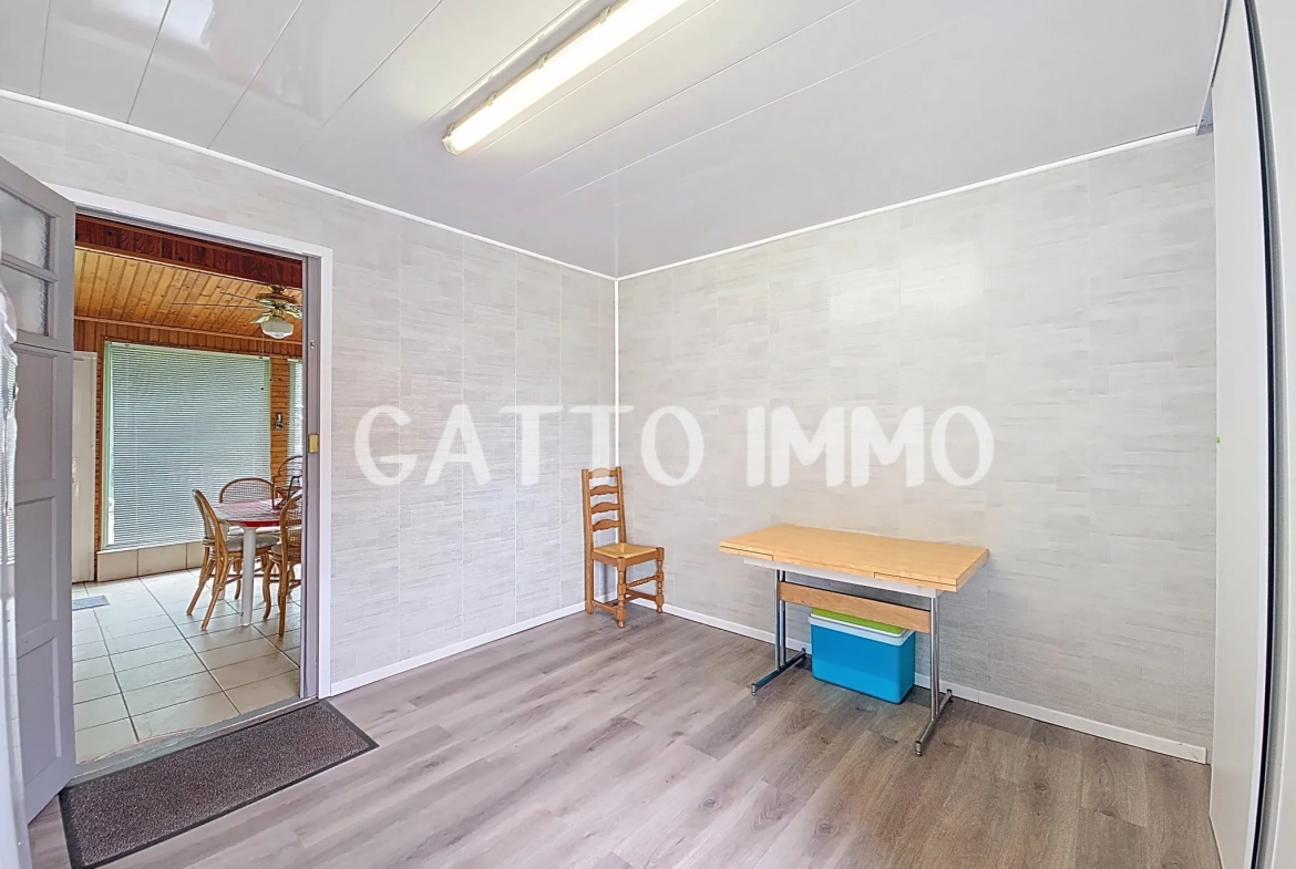 Maison à rénover de 130m² avec 5 chambres, grand garage et jardin à Marly 