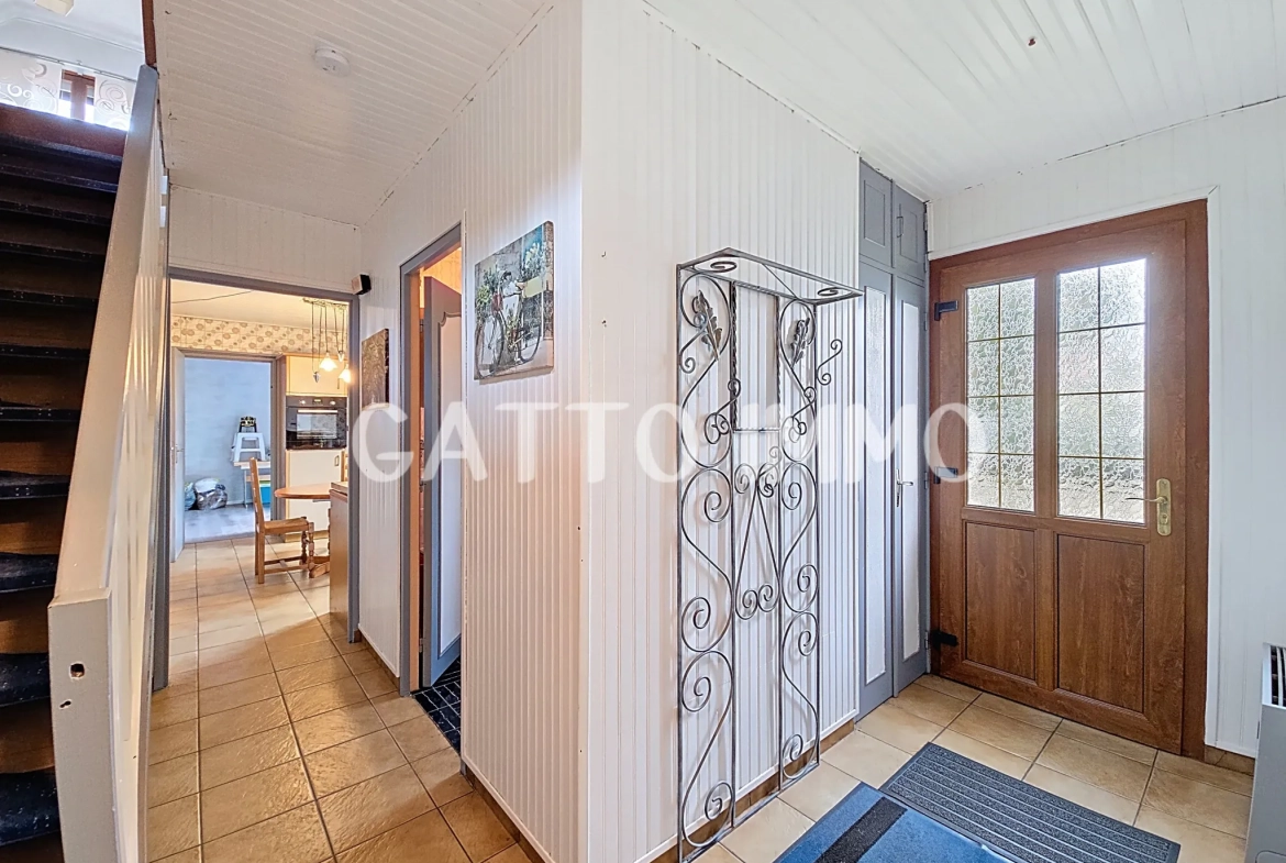 Maison à rénover de 130m² avec 5 chambres, grand garage et jardin à Marly 