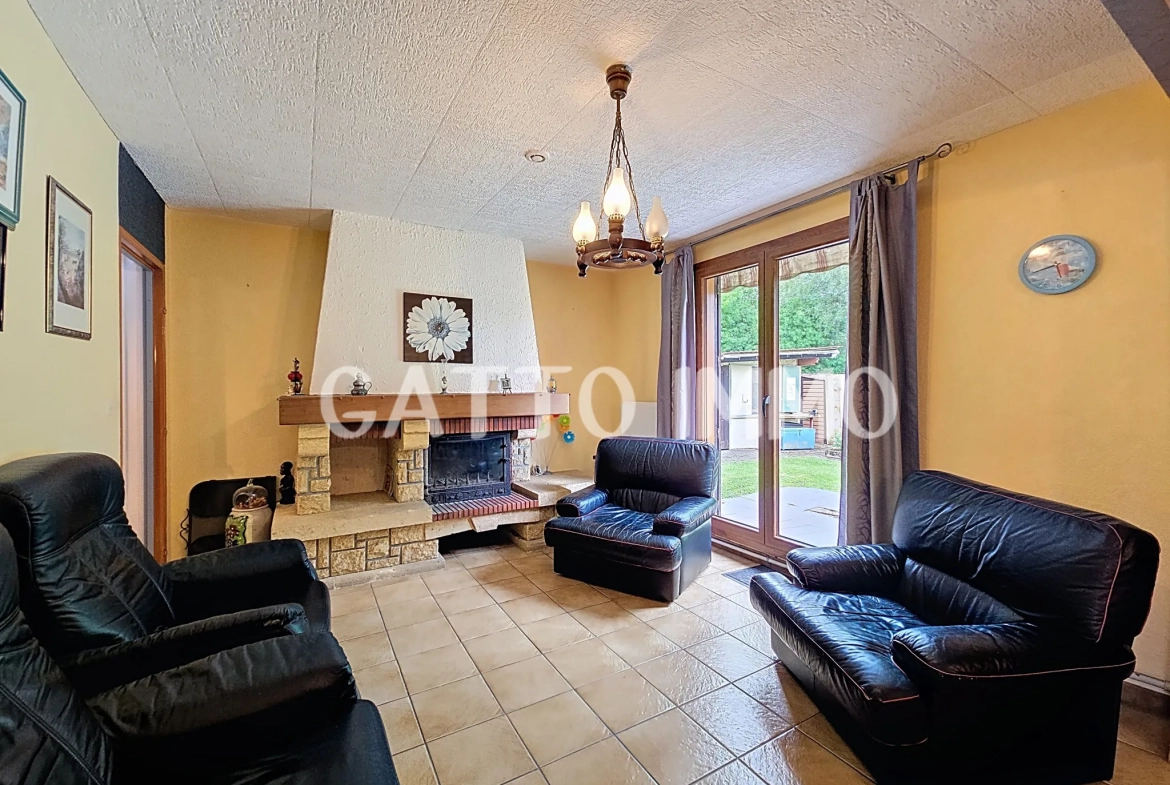 Maison à rénover de 130m² avec 5 chambres, grand garage et jardin à Marly 