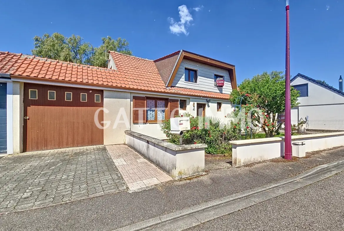 Maison à rénover de 130m² avec 5 chambres, grand garage et jardin à Marly 