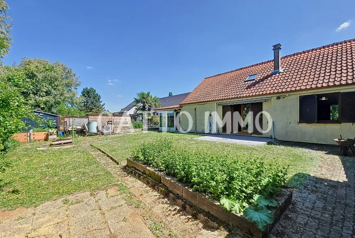 Maison à rénover de 130m² avec 5 chambres, grand garage et jardin à Marly 