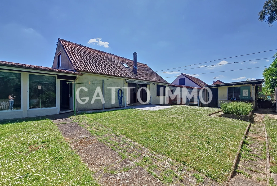 Maison à rénover de 130m² avec 5 chambres, grand garage et jardin à Marly 
