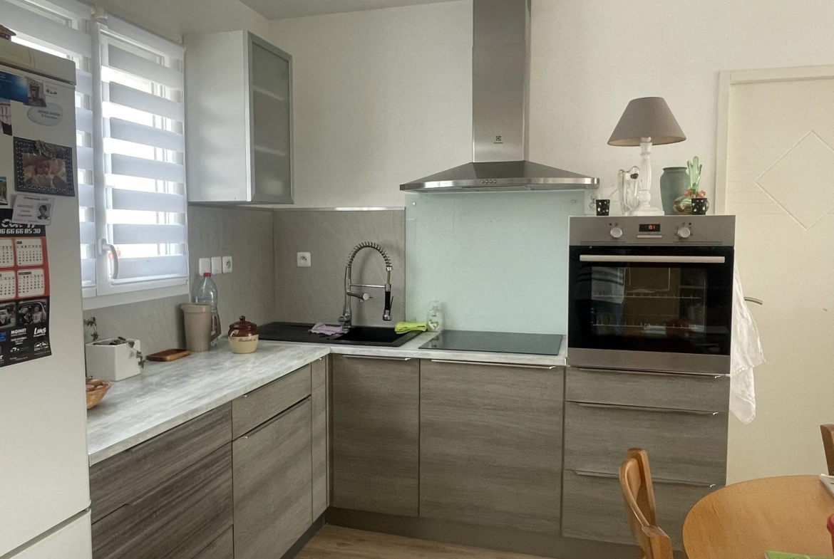 Maison de plain-pied à Aigrefeuille d'Aunis avec terrasse et chauffage au sol 