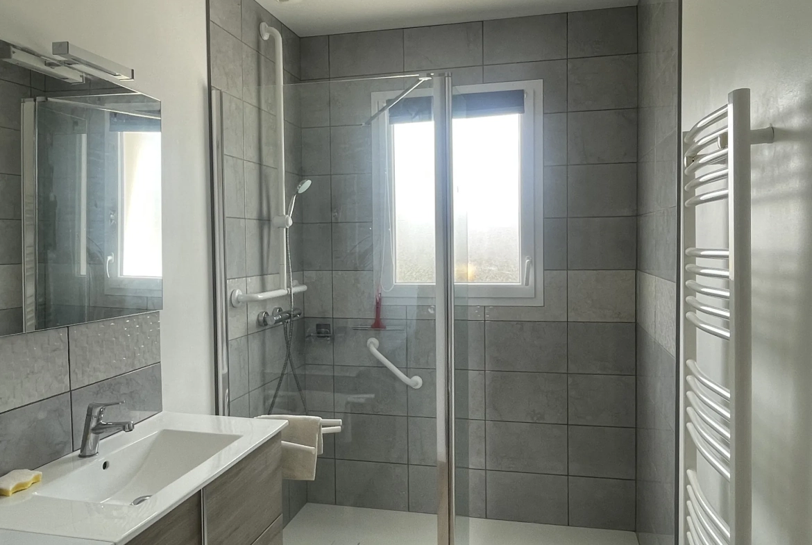 Maison de plain-pied à Aigrefeuille d'Aunis avec terrasse et chauffage au sol 