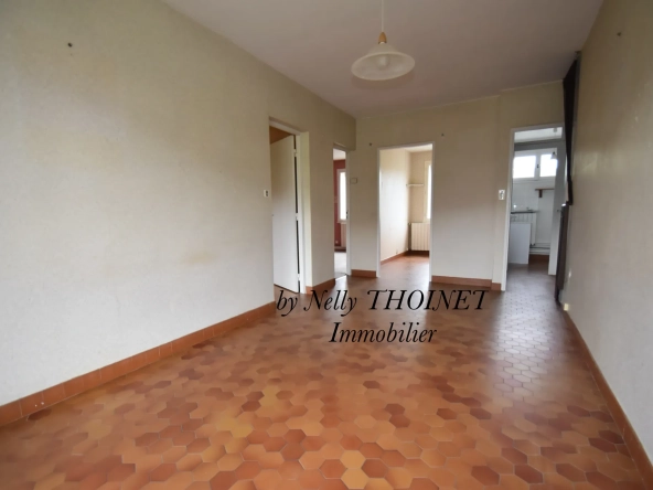 Charmant appartement T3 avec balcon et cave à Besse et Saint-Anastaise, idéal pour investissement ou résidence principale