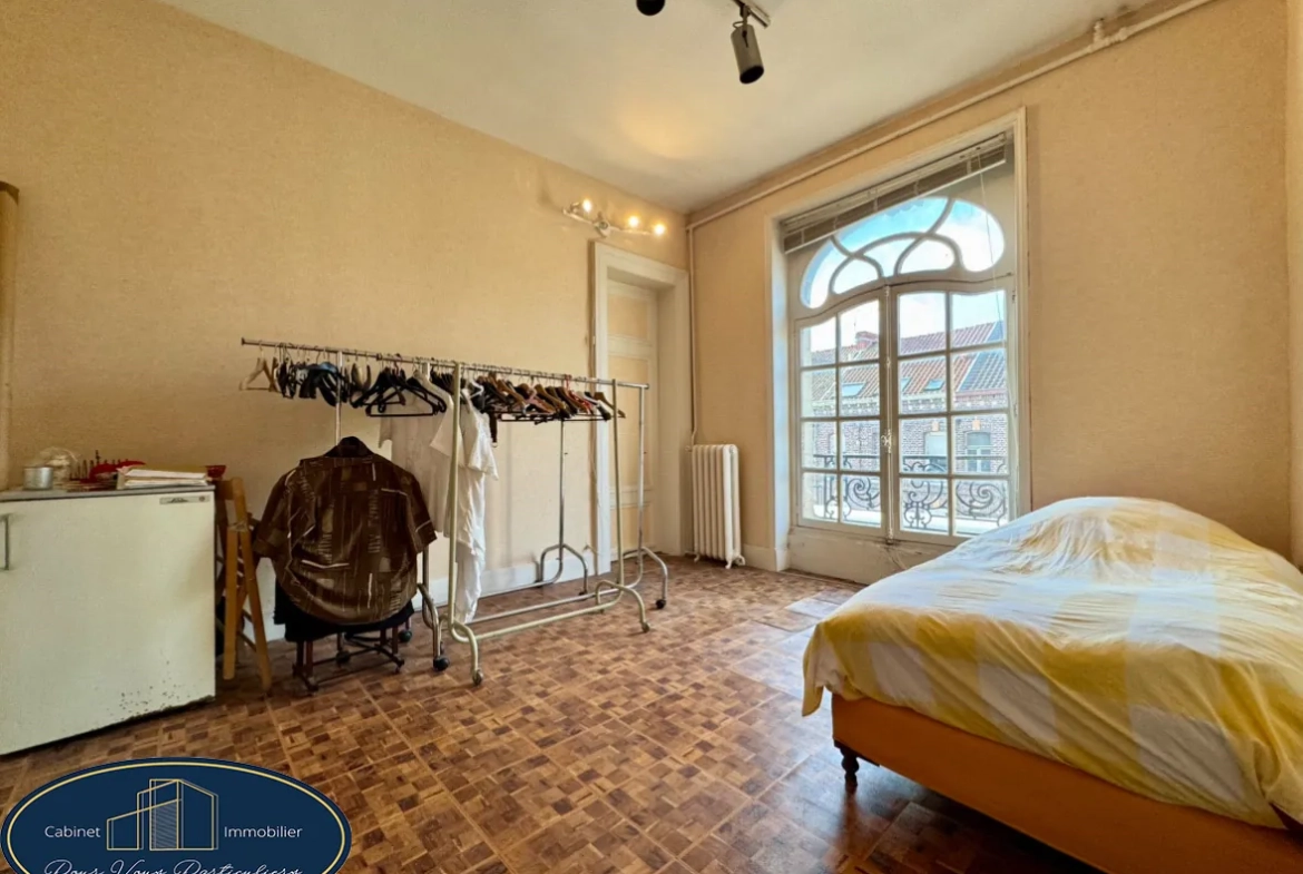 Maison à rénover avec potentiel de studios à Raismes centre-ville 