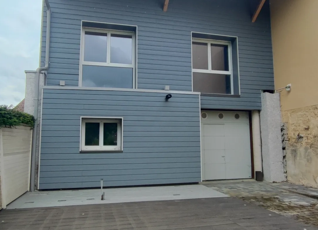 Maison de ville récente 210 m² avec terrain à Voujeaucourt 