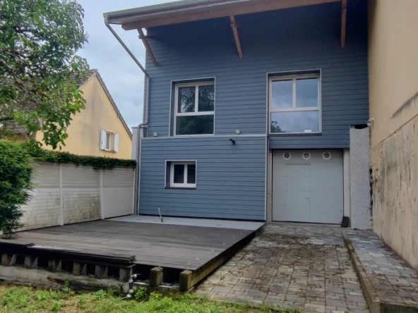 Maison de ville récente 210 m² avec terrain à Voujeaucourt