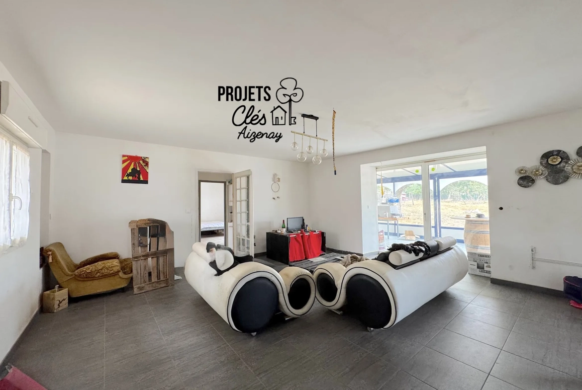 Maison de plain-pied avec véranda et grand terrain à Aizenay 