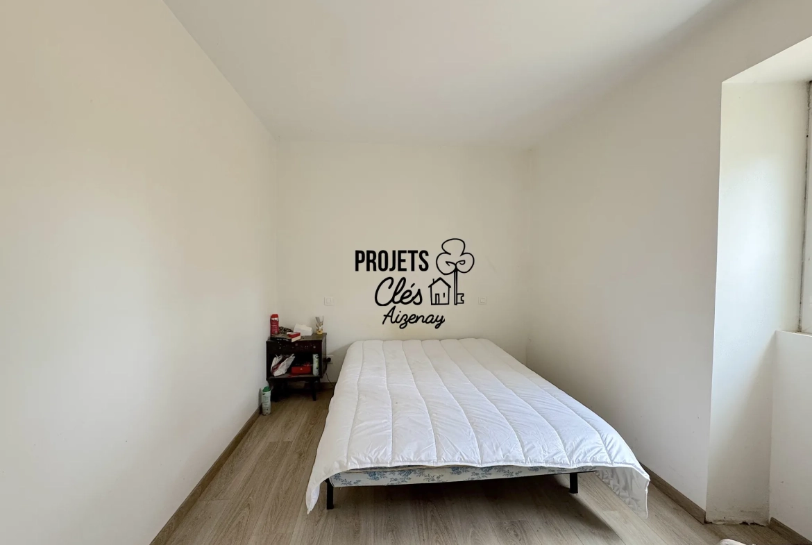 Maison de plain-pied avec véranda et grand terrain à Aizenay 