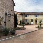 Maison de charme entièrement rénovée avec jardin, garage et dépendances à Lapalisse