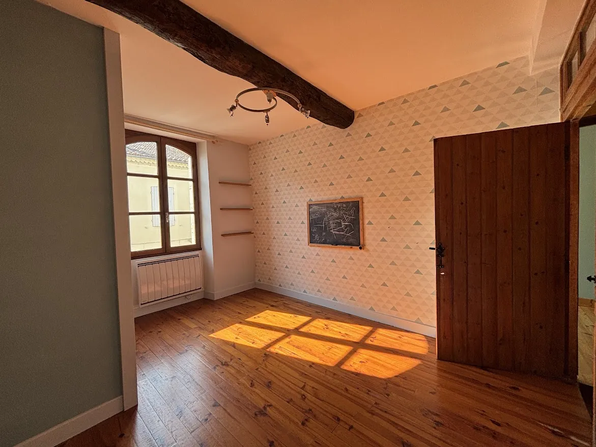 Maison de ville avec cour et charme authentique à Fleurance 